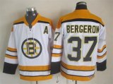 Boston Bruins Patrice Bergeron #37 white yellow CCM hockey jersey